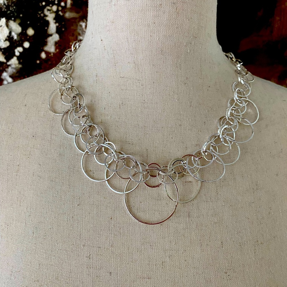 Silver Alfani necklace and matching earrings